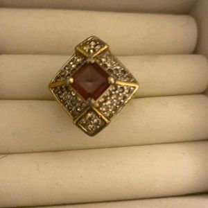 VTG Uniquely Shaped Ring with a Purple Stone surrounded by Pave crystals…